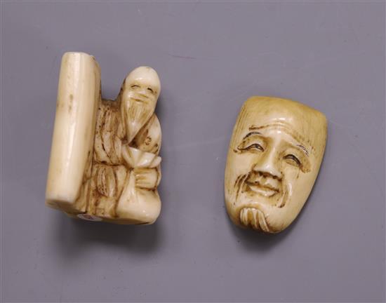 Two Meiji period ivory netsuke of a sage and a mask, (526, 605)